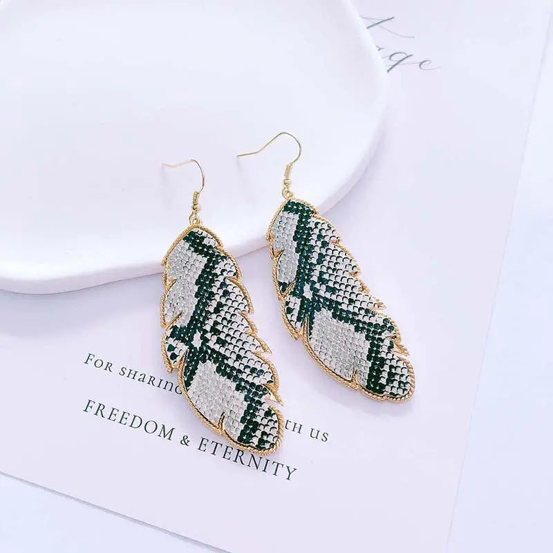 European and American foreign trade accessories PU leather leaf exaggerated earrings fashionable simple long snake leopard print earrings AQP-STORE