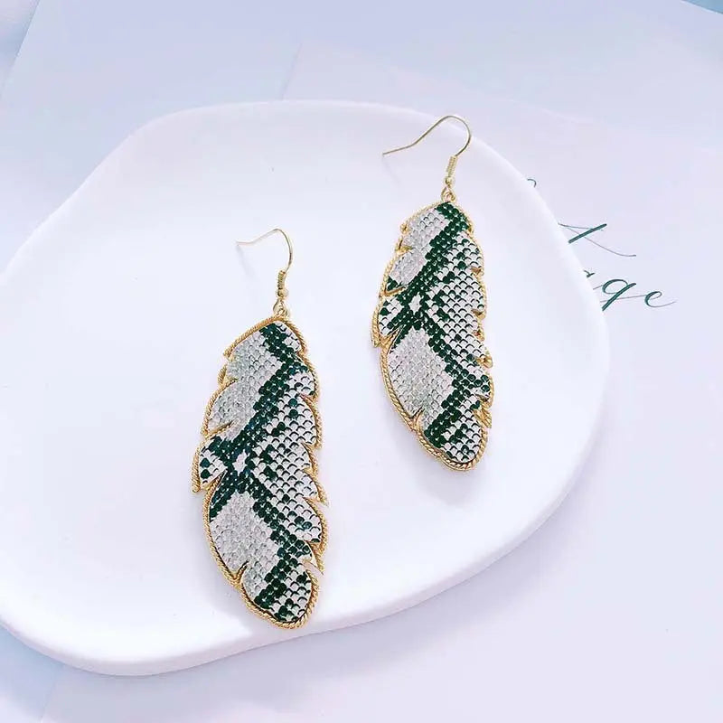 European and American foreign trade accessories PU leather leaf exaggerated earrings fashionable simple long snake leopard print earrings AQP-STORE