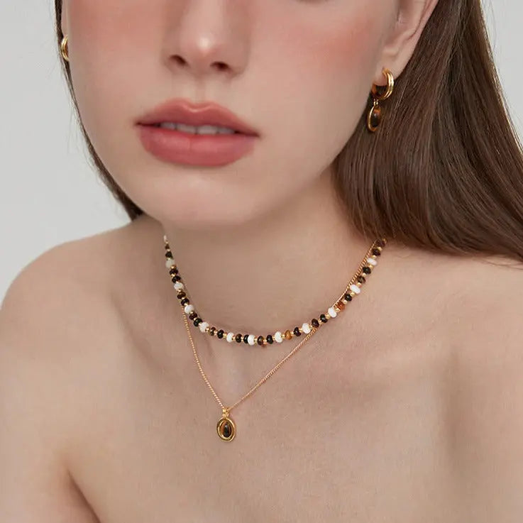 2023 new tiger eye stone series senior necklace Europe and the United States retro light luxury niche design gold collarbone chain AQP-STORE